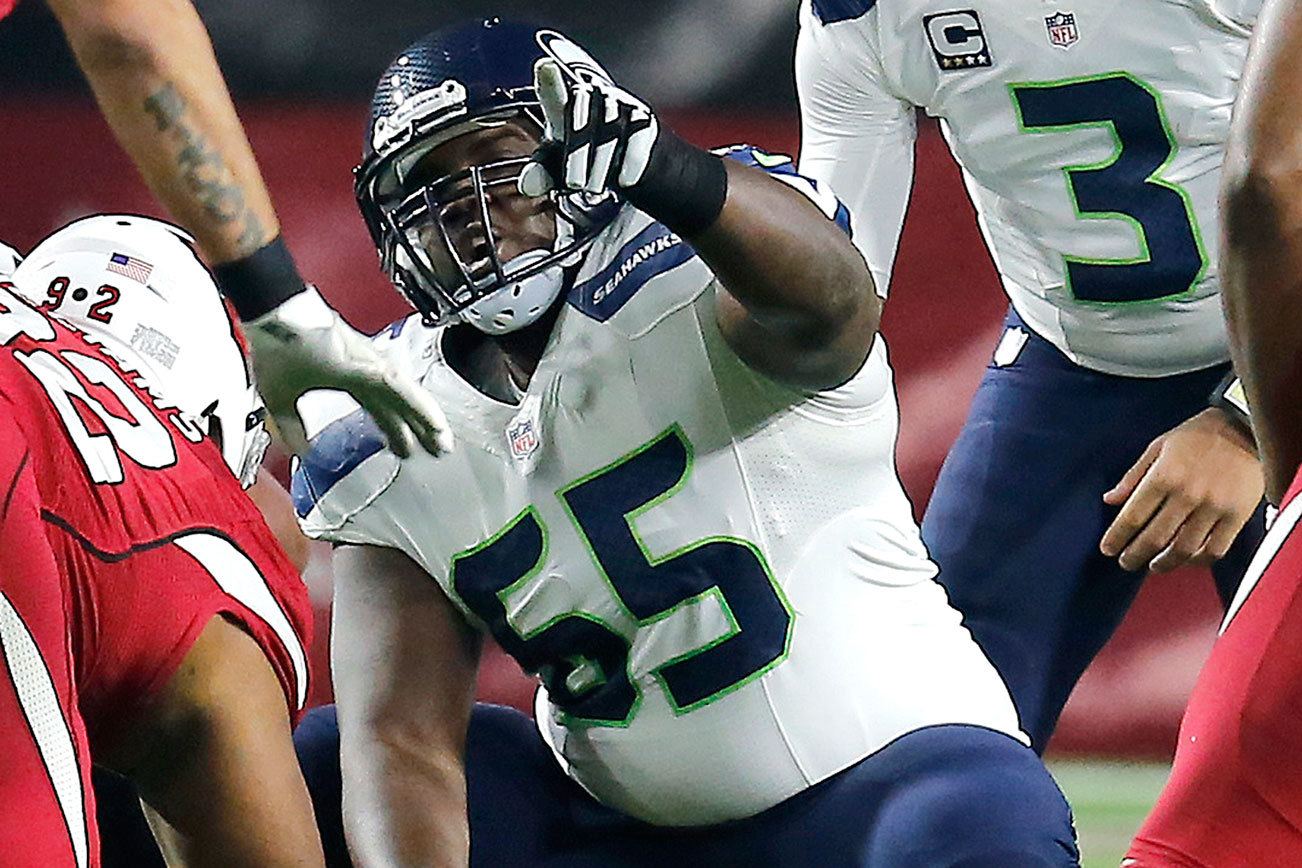 Former starting center Lewis among Seahawks roster cuts