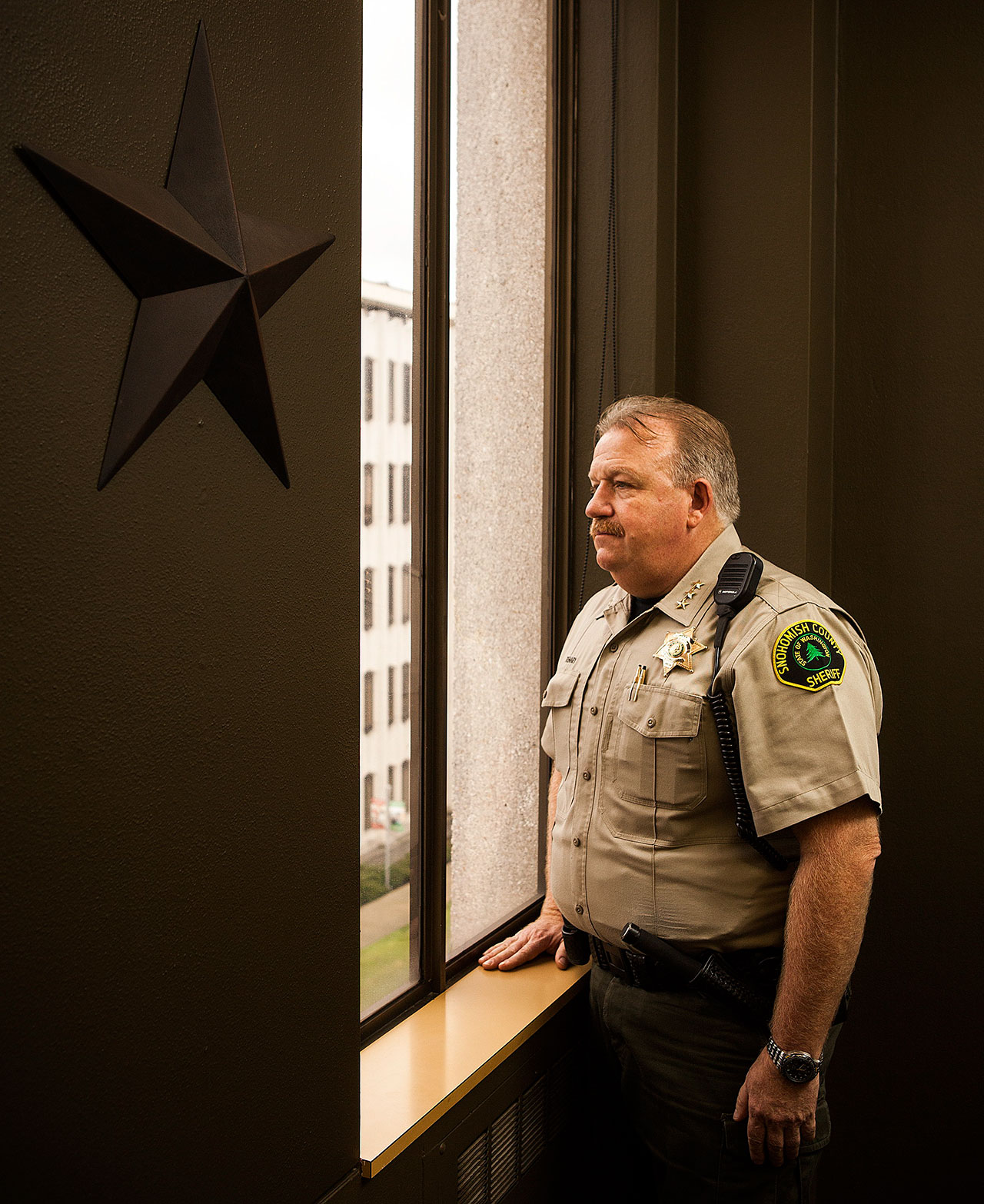 Snohomish County Sheriff Ty Trenary oversees the county's jail. He is adamant that more needs to be done to address mental illness, drug-addiction and homelessness that doesn't involve incarceration. (Ian Terry / The Herald)