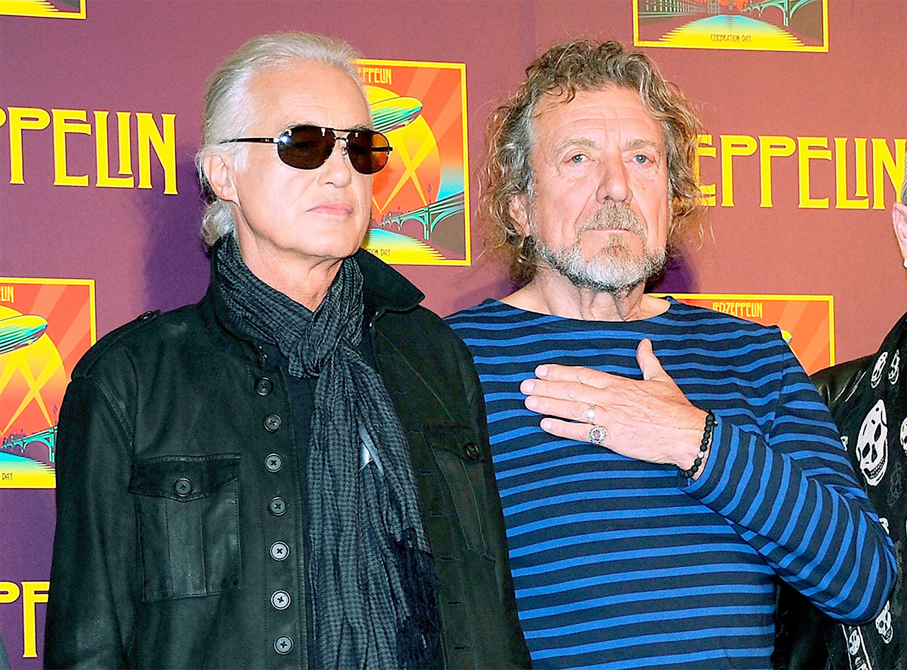 Led Zeppelin guitarist Jimmy Page, left, and singer Robert Plant prevailed Thursday in a court case over whether they copied the riff in “Stairway to Heaven.” (Associated Press)