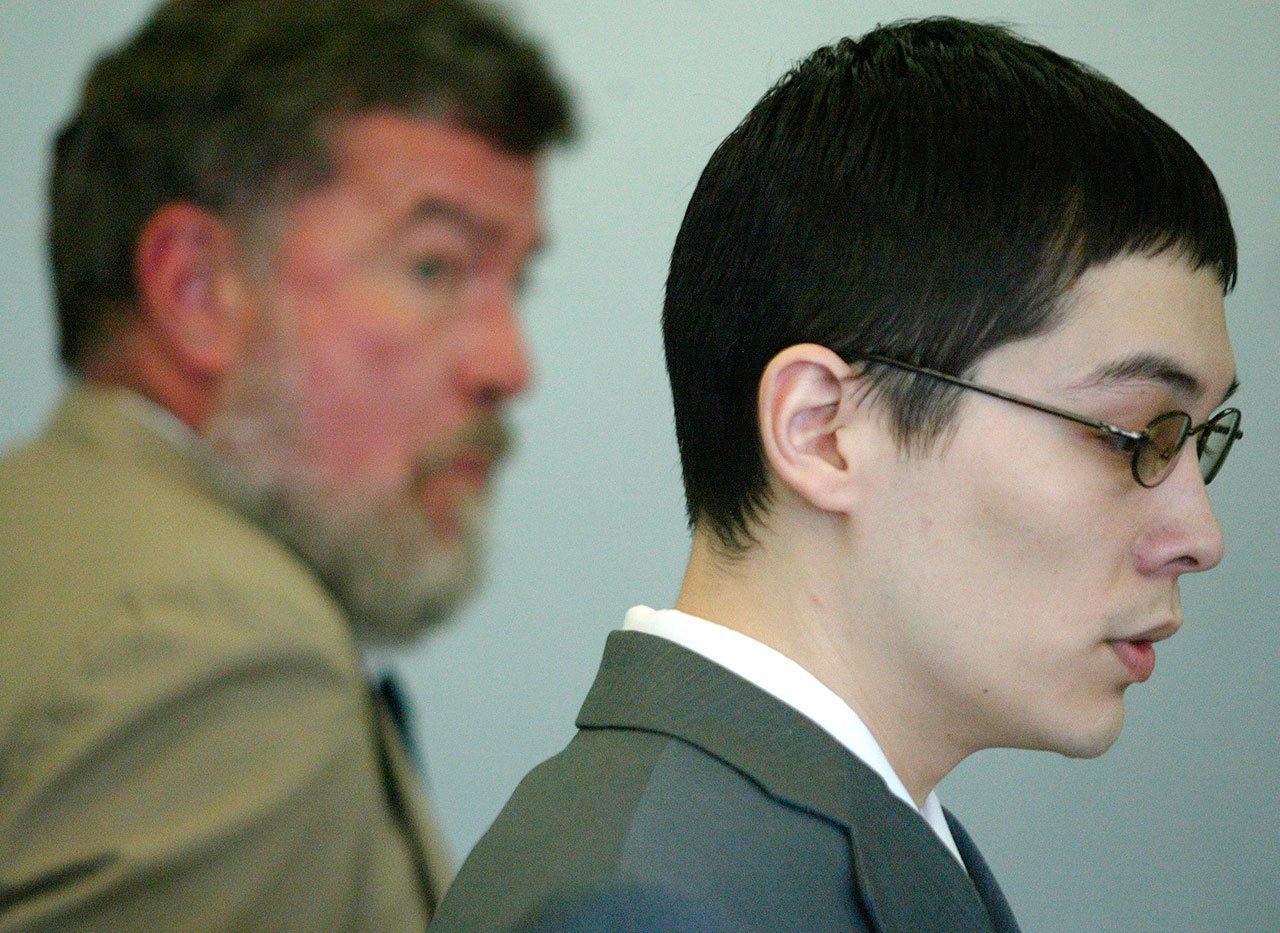 John Whitaker, right, waits to be escorted out of the courtroom after being convicted in 2004 on all counts including aggravated murder charges in the killing of Rachel Burkheimer in September 2002. (Michael V. Martina / The Herald, file)