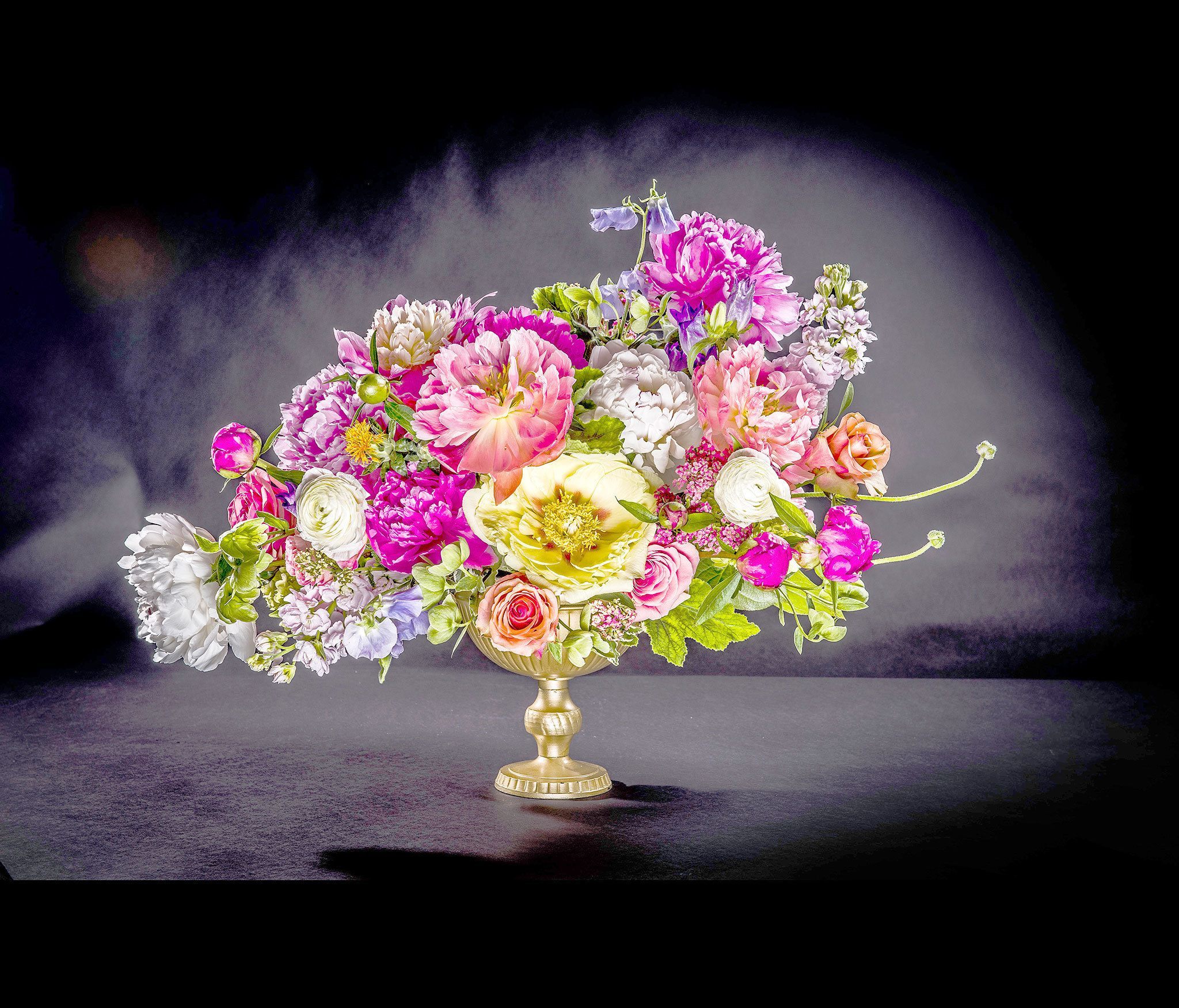 A peony arrangement by Washington florist Jo Oliver. Peonies have captivated gardeners since classical times and have never fallen from favor. As anyone can see, their drama and beauty is for the ages. (Bill O’Leary / Washington Post)