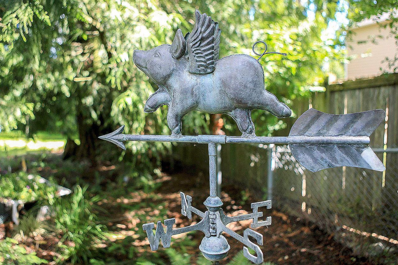 Whimsy in the garden of Michael and Gary Crawford in Mill Creek. (Kevin Clark / The Herald)