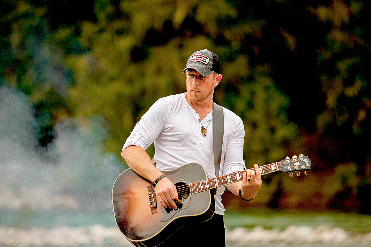 Country music artist Aaron Crawford, a Snohomish High School alum, performs Saturday evening at the Spur Festival at the Darrington Music Park.