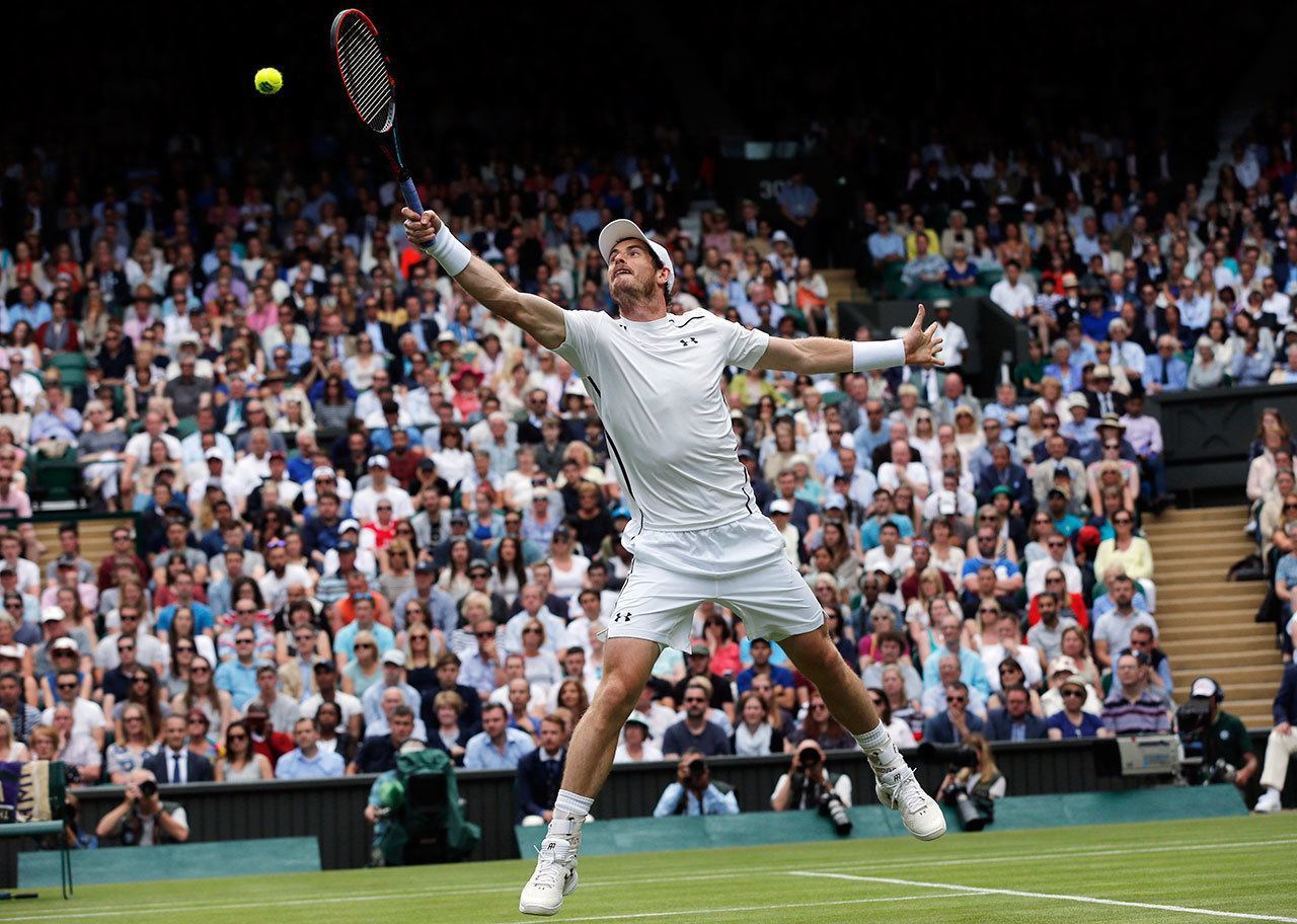 Andy Murray of Britain plays a return to Liam Broady of Britain during their men’s singles match on day two of the Wimbledon Tennis Championships in London, Tuesday, June 28, 2016. (AP Photo/Ben Curtis)