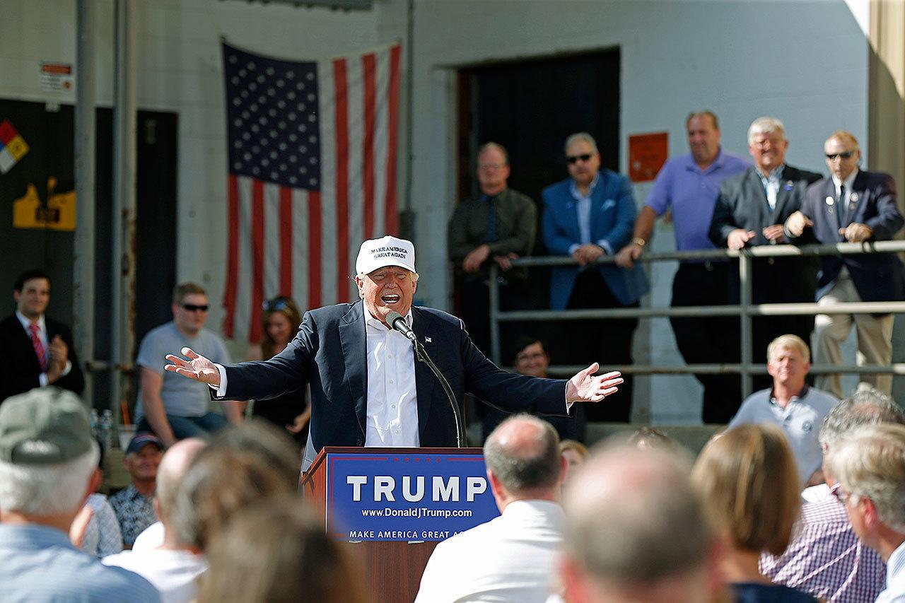 Republican presidential candidate Donald Trump speaks at a town hall-style campaign event at the former Osram Sylvania light bulb factory Thursday in Manchester, New Hampshire. (AP Photo/Robert F. Bukaty)