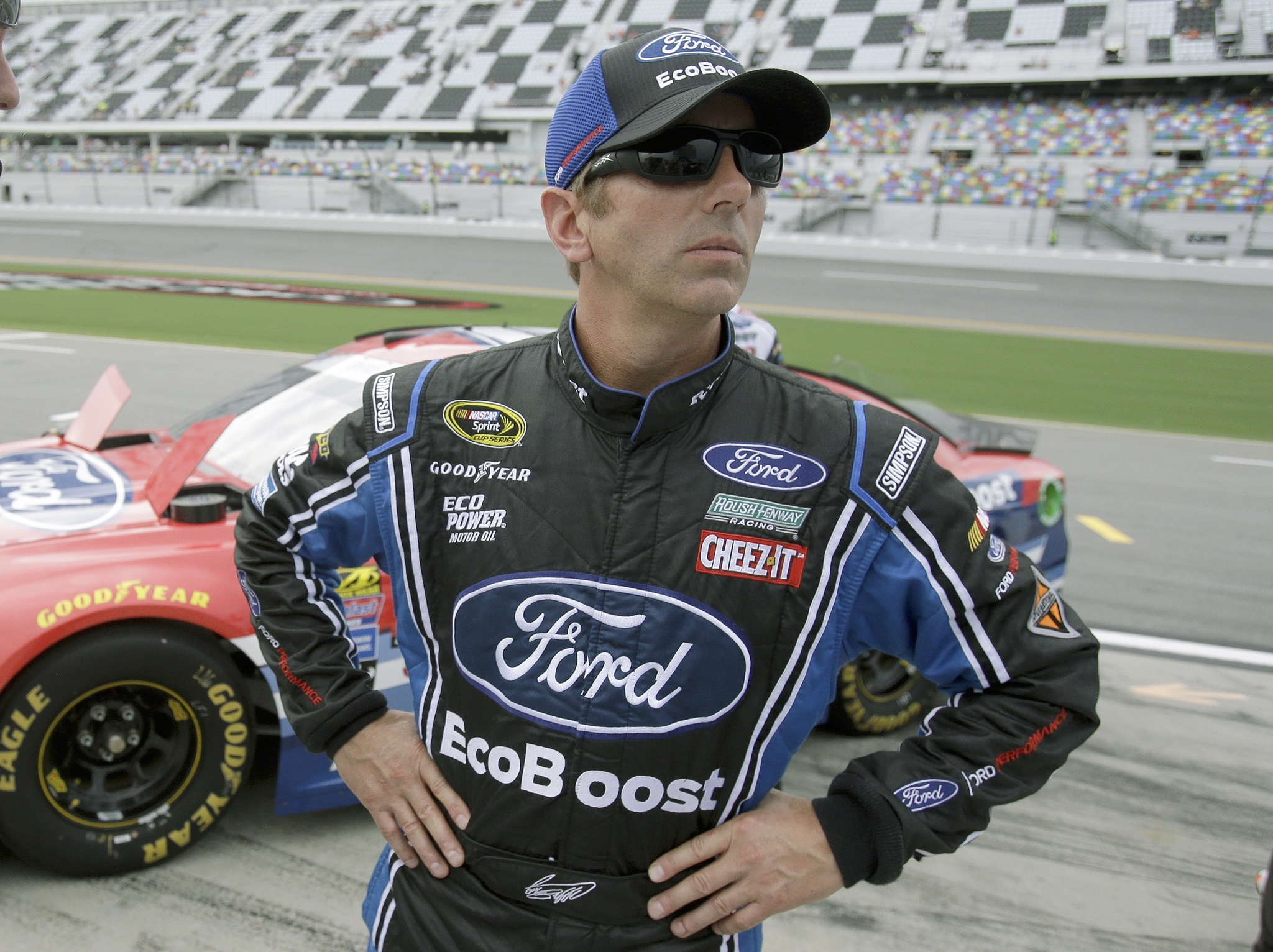 Greg Biffle looks up at the scoring monitor waiting for results shortly before he won the pole position for Saturday’s NASCAR Sprint Cup race at Daytona International Speedway Friday in Daytona Beach, Fla. (AP Photo/John Raoux)