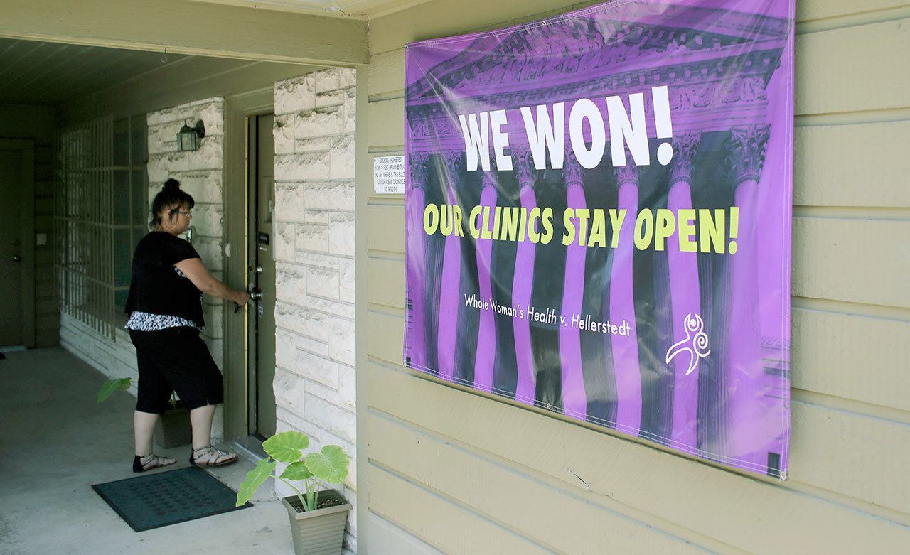 A woman enters Choice Clinic on June 27 in Austin, Texas. Abortion providers celebrated the U.S. Supreme Court striking down major Texas abortion restrictions. (AP Photo/Eric Gay)