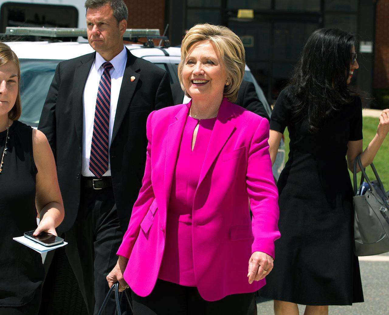 Democratic presidential candidate Hillary Clinton, followed by aide Huma Abedin, right, walks on the tarmac as she arrives to board Air Force One at Andrews Air Force Base, Maryland, on Tuesday. President Barack Obama Clinton traveled to Charlotte, North Carolina. to campaign together. (AP Photo/Jose Luis Magana)
