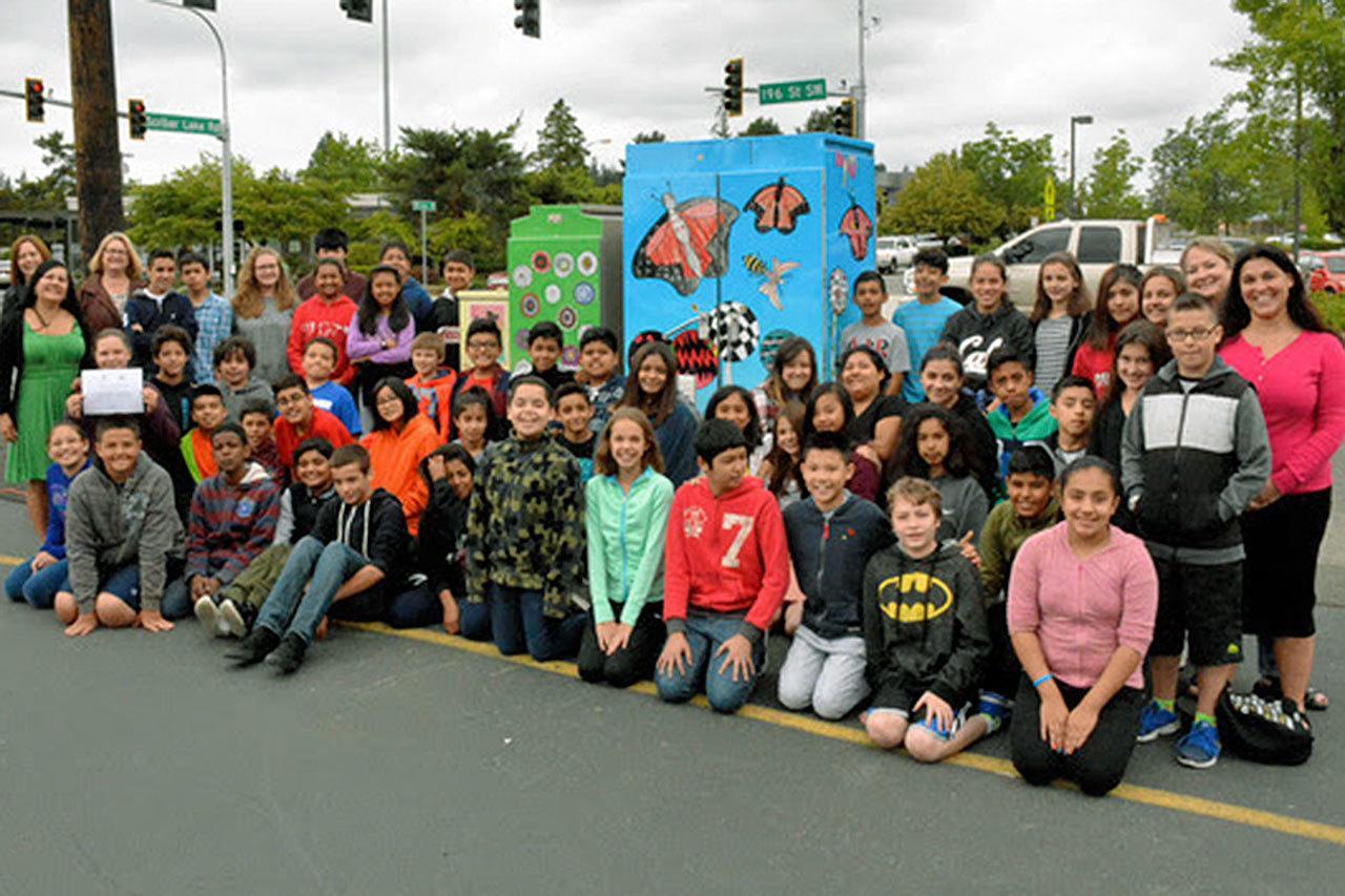 Sixth-grade students from Cedar Valley Community School worked with local artists to create artful wraps for traffic signal boxes at the corner of 196th Street SW and Scriber Lake Road. (Contributed photo)