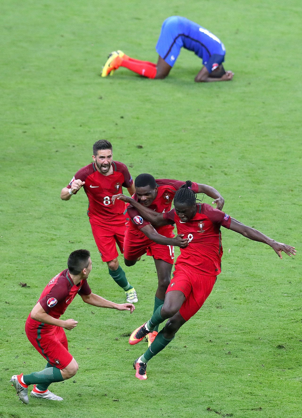 Portugal’s Eder (right) celebrates with teammates after scoring the game’s lone goal during the Euro 2016 final soccer match between Portugal and France at the Stade de France in Saint-Denis, north of Paris. (AP Photo/Thibault Camus)
