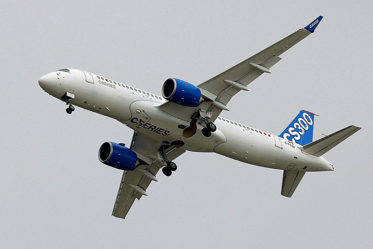 The Bombardier CS 300 performs during the Paris Air Show in 2015. (AP Photo/Francois Mori)
