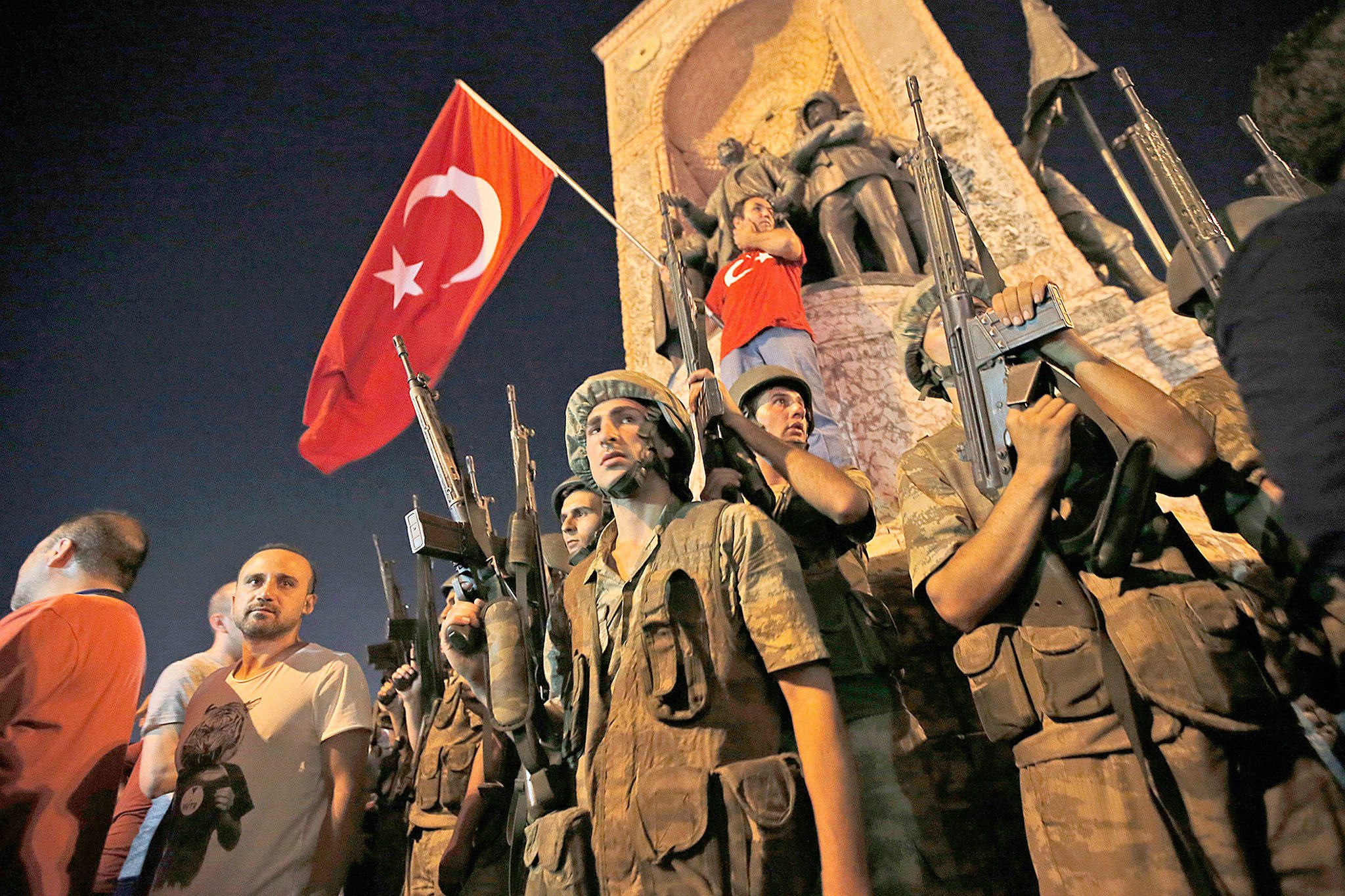 Turkish soldiers secure the area as supporters of Turkey’s President Recep Tayyip Erdogan protest in Istanbul’s Taksim square early Saturday. (AP Photo/Emrah Gurel)