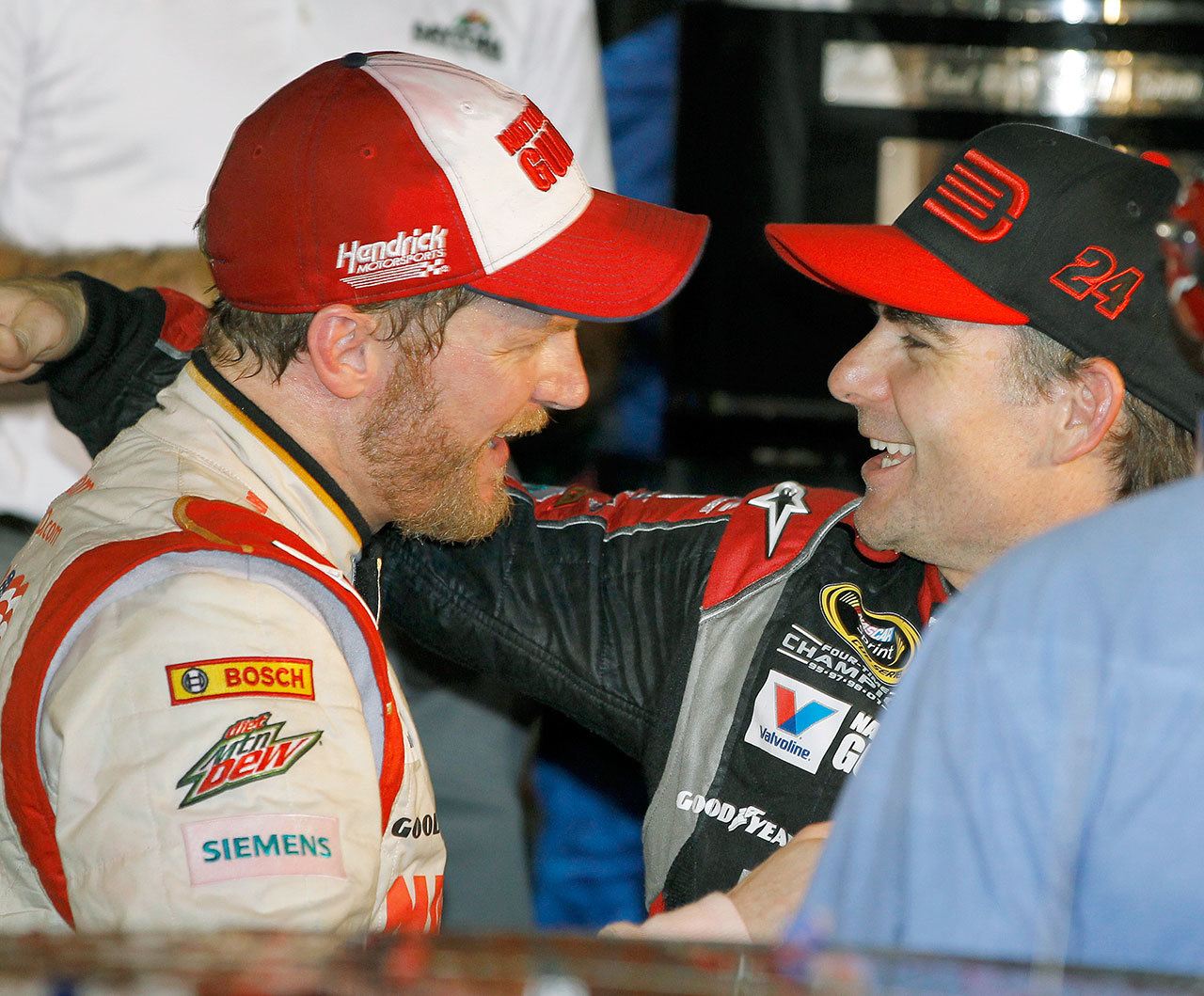 In this Feb. 23, 2014, photo, Dale Earnhardt Jr. (left) celebrates in Victory Lane with teammate Jeff Gordon after winning the NASCAR Daytona 500 Sprint Cup race at Daytona International Speedway in Daytona Beach, Fla. Gordon will get one more shot to win in Indianapolis this weekend when he replaces Earnhardt Jr. in the No. 88 car. (AP Photo/Terry Renna, File)