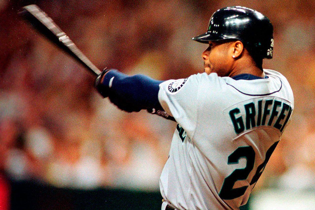 The Mariners’ Ken Griffey Jr. connects for his 40th home run of the season during the fourth inning of a game against Tampa Bay on July 21, 1998, at Tropicana Field in St. Petersburg, Fla. (AP Photo/Steve Nesius)
