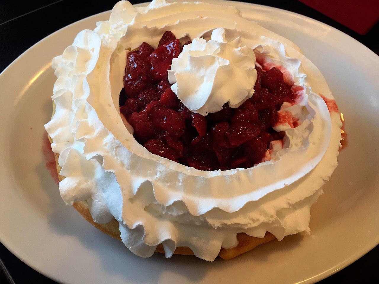 The Belgian waffle with strawberries and whipped cream at Jake’s Cafe in Snohomish is large enough to serve two people. (Ayako Brown​)