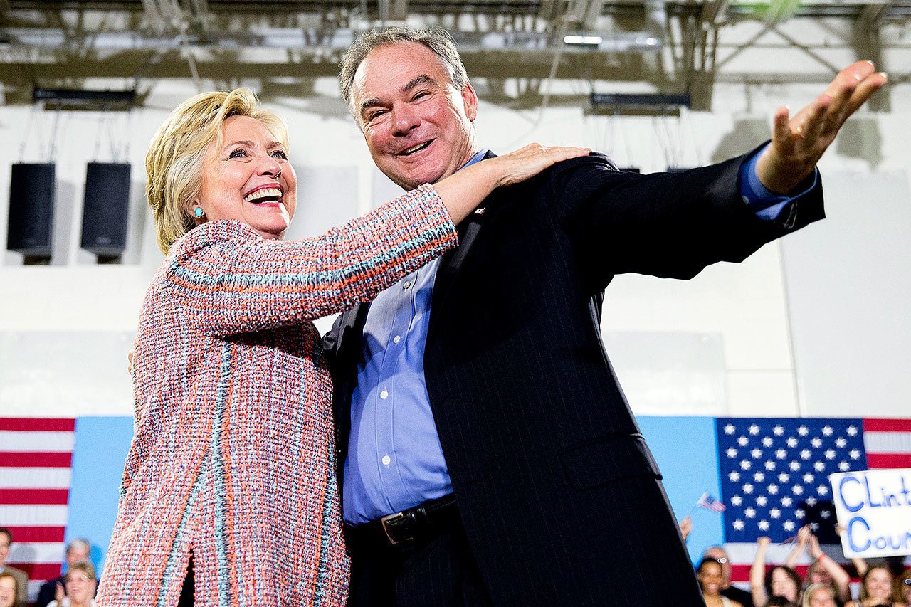 Democratic presidential candidate Hillary Clinton, accompanied by Sen. Tim Kaine, speaks at a rally in Annandale, Virginia, on July 14. (AP Photo/Andrew Harnik)