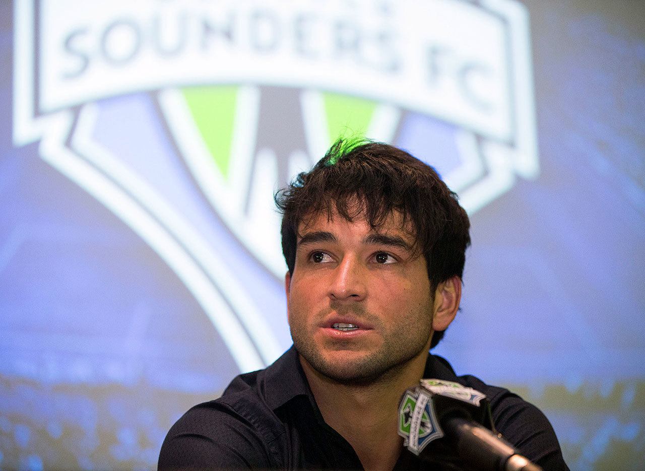 The Seattle Sounders’ newest acquisition, Nicolas Lodeiro, speaks at a press conference Wednesday in Seattle. (Grant Hindsley/seattlepi.com via AP)
