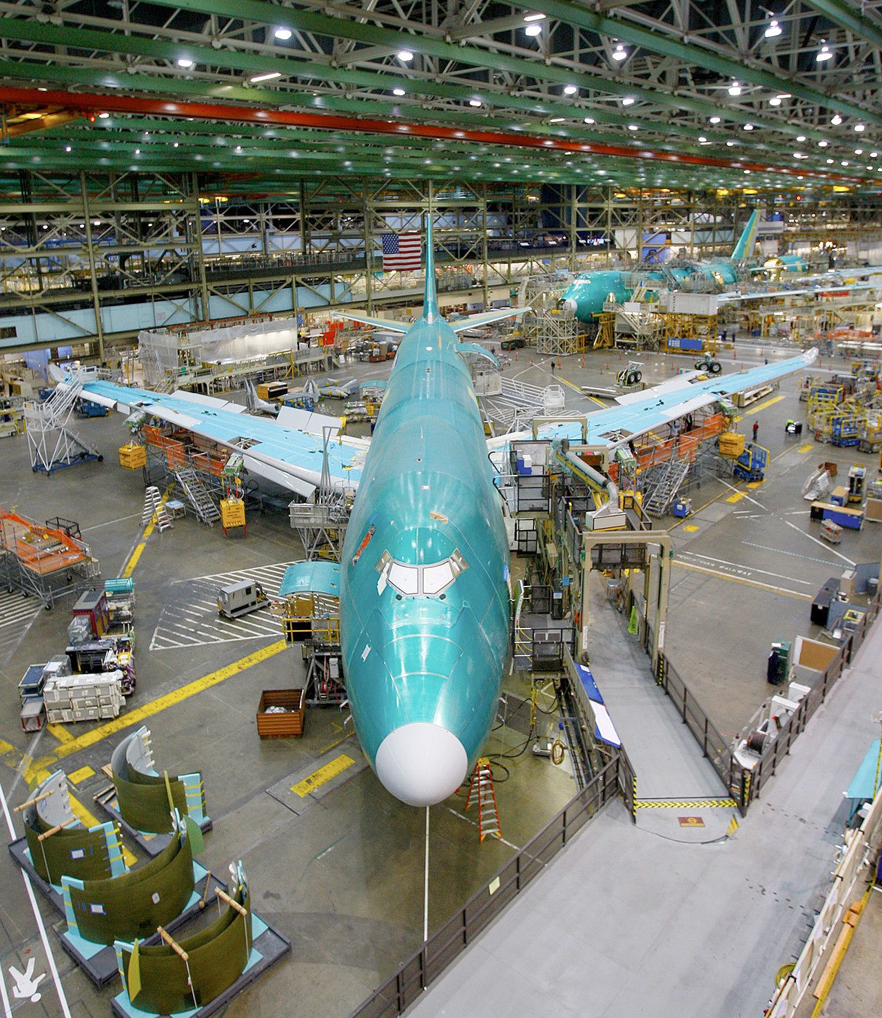 A Boeing 747 nears the end of the assembly line and roll out. (Michael O’Leary / The Herald)