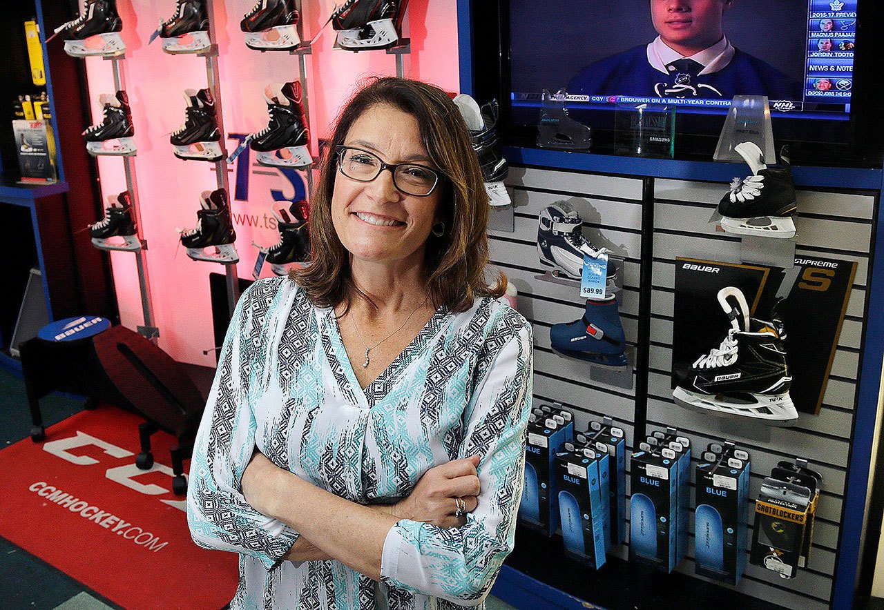 Elise Amendola / Associated Press                                Susan Frazier, business manager for TSR Hockey is seen at the business, in Salem, New Hampshire on July 6.