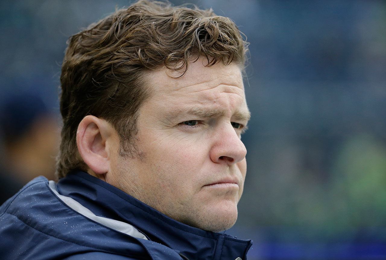 Seahawks general manager John Schneider spoke Thursday about his new contract extension and the state of the team heading into the start of training camp this weekend. (AP Photo/Elaine Thompson)