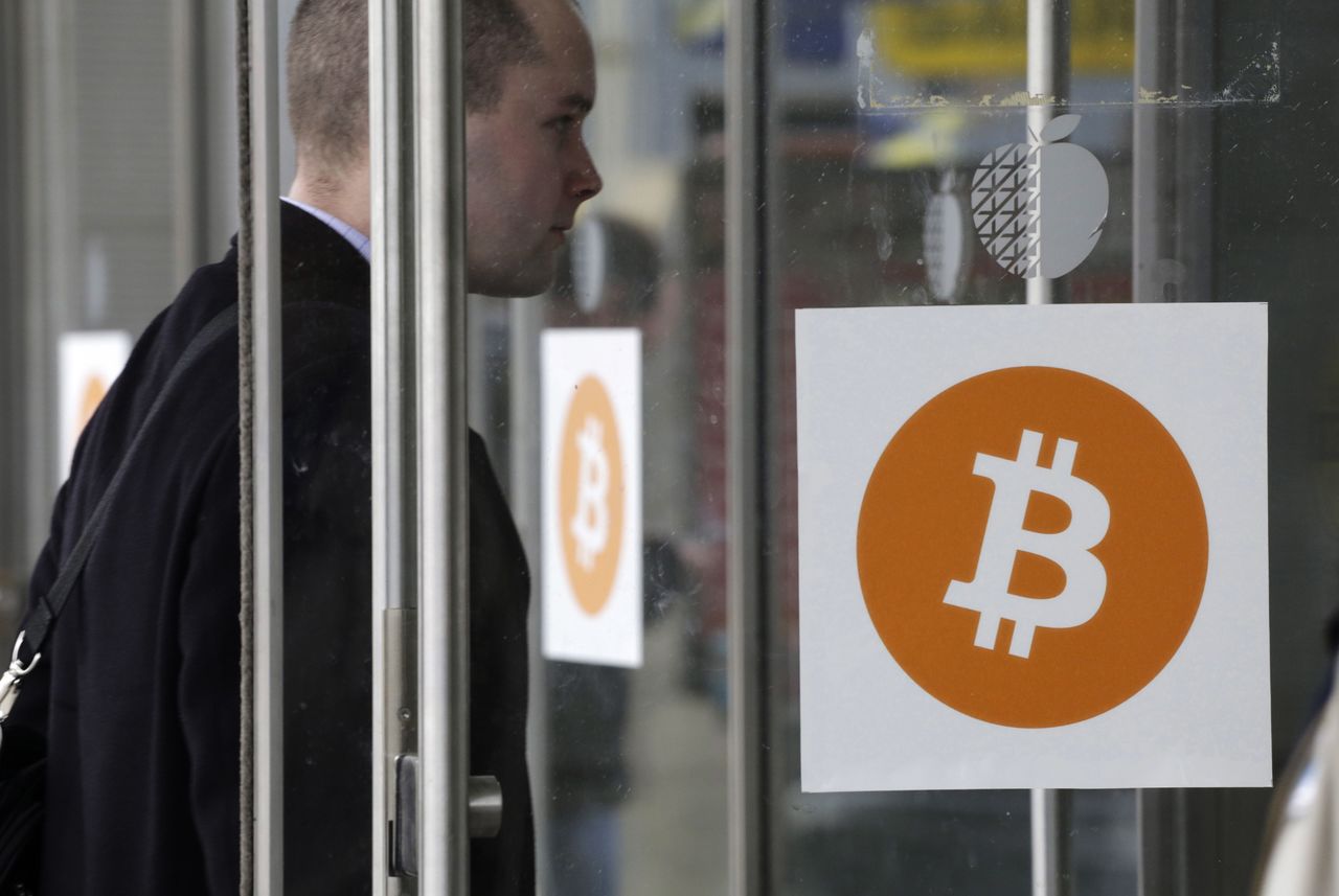 A man enters the Inside Bitcoins conference and trade show Monday in New York.