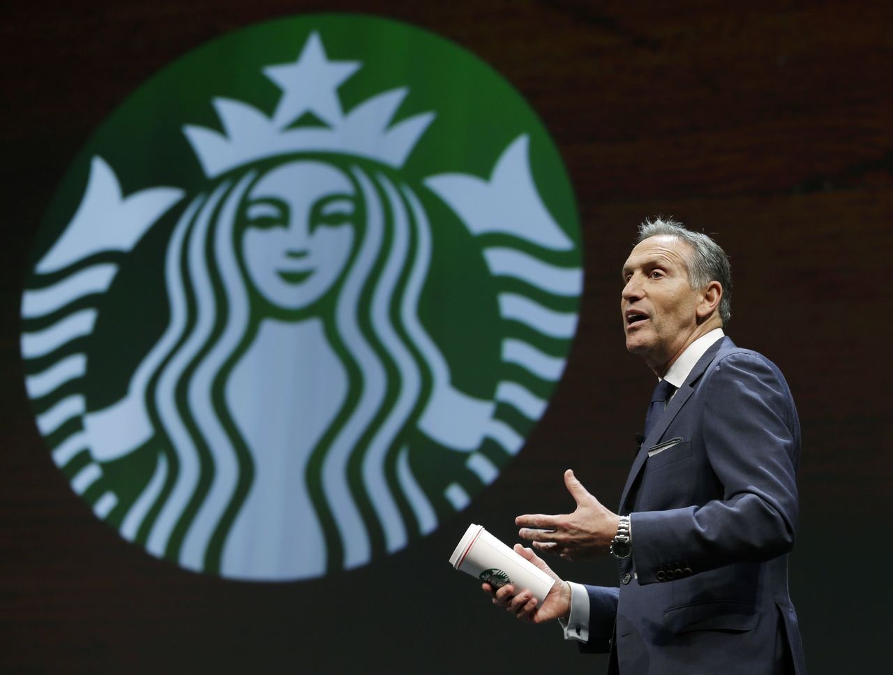In this March 23 photo, Starbucks CEO Howard Schultz speaks at the coffee company’s annual shareholders meeting in Seattle.