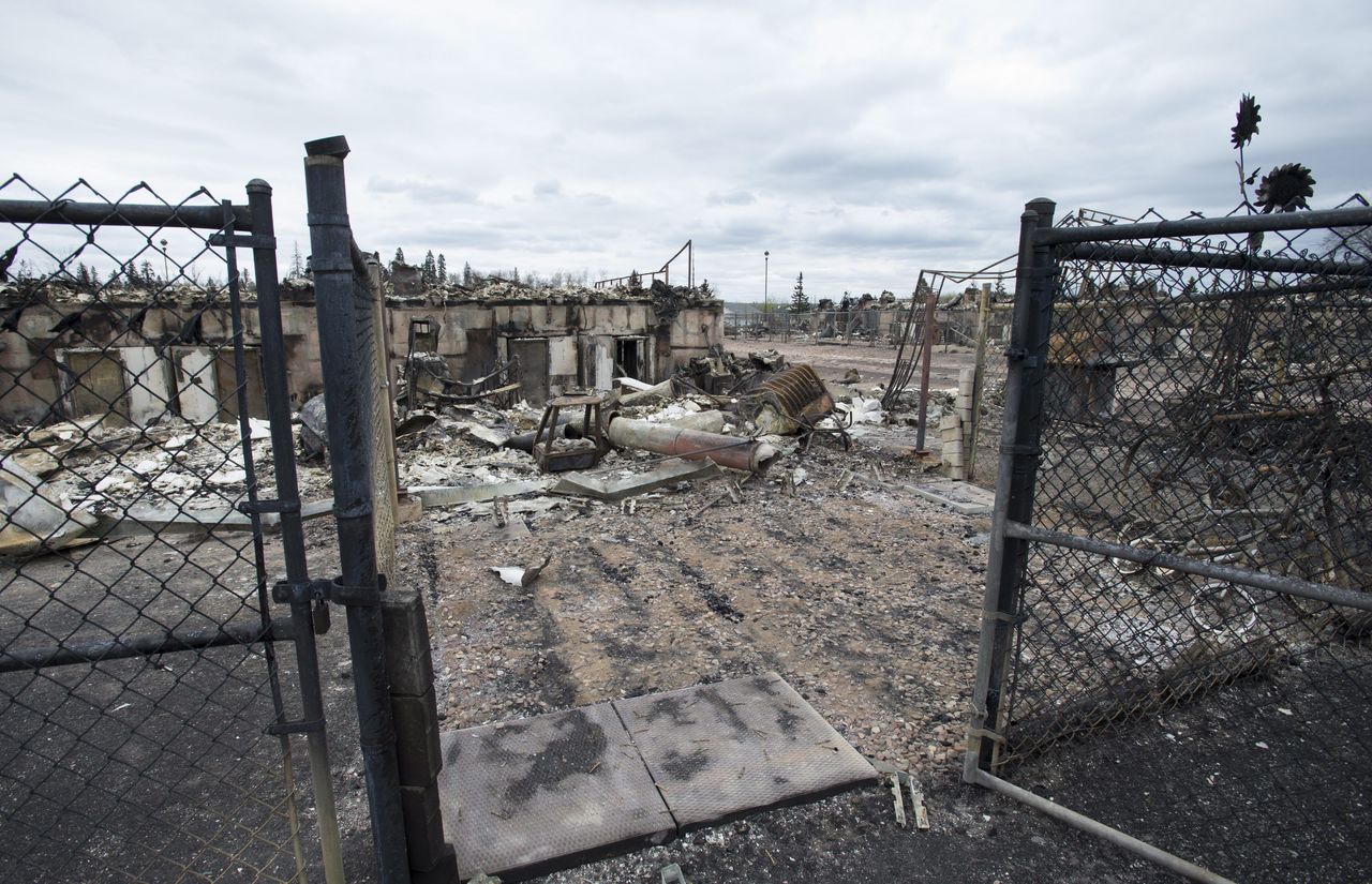 The burnt remains of a home is viewed in the Abasands neighborhood during a media tour of the city of Fort McMurray, Alberta, on May 9.