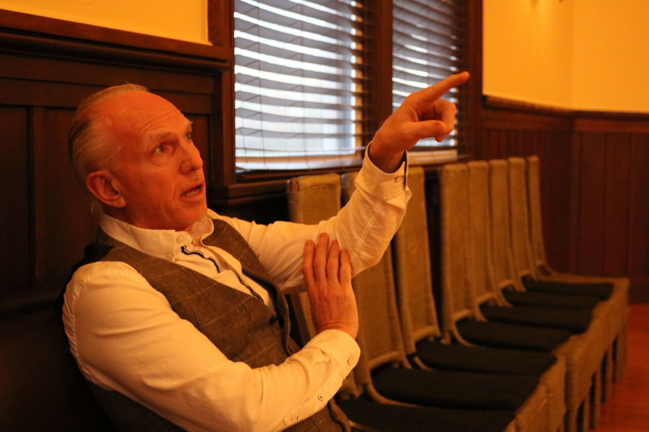 Scott Swoboda points out a detail in his newly remodeled wedding venue, Feather Ballroom. He created the space out of Snohomish’s former Eagles Hall.