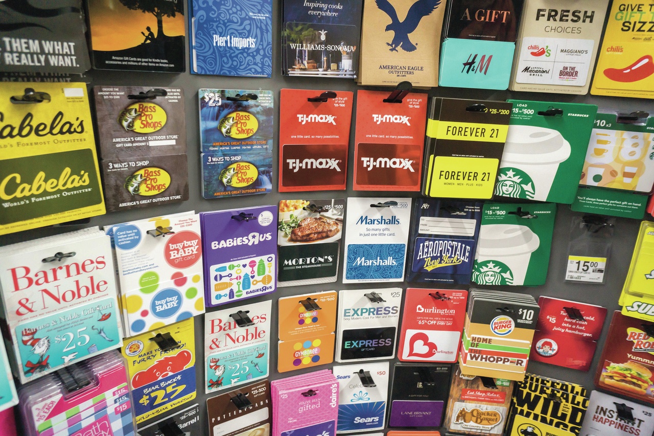 A selection of gift cards for sale in a store in New York. People who don’t use their gift cards are using online exchanges to turn them into cash.