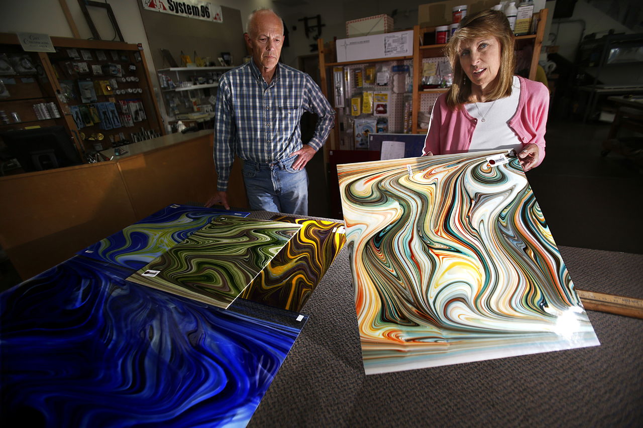 Colleen Price and her husband, Stan, show examples of popular Spectrum Glass work that has been a staple of their own business, Covenant Art Glass, in Everett. Spectrum Glass, a south Snohomish County business, plans to close in July.