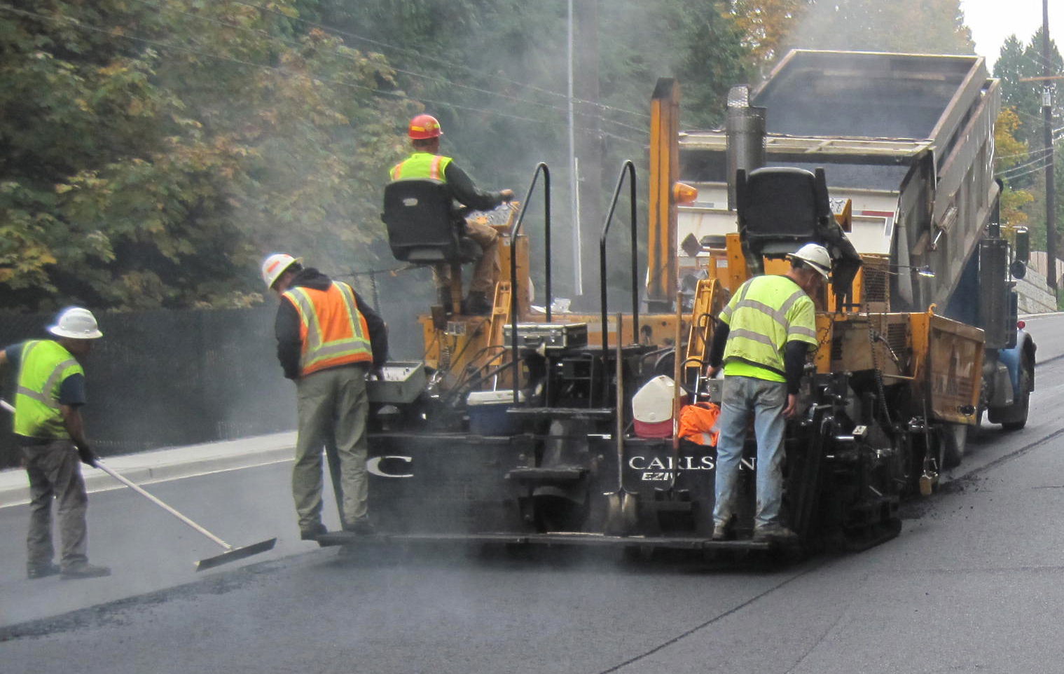 Snohomish County Public Works contractor crews have begun their summer 2016 paving work on 13 miles of roadway, primarily in the Monroe and Stanwood areas. This photo is an example of paving work from a previous summer. A new layer of asphalt is put down over the old.