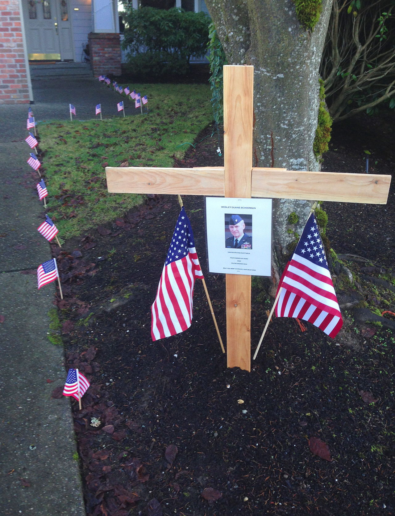 This memorial to retired Air Force Maj. Wesley Schierman was put up by neighbors outside his home in Everett’s Silver Lake area after Schierman died in Everett in 2014.