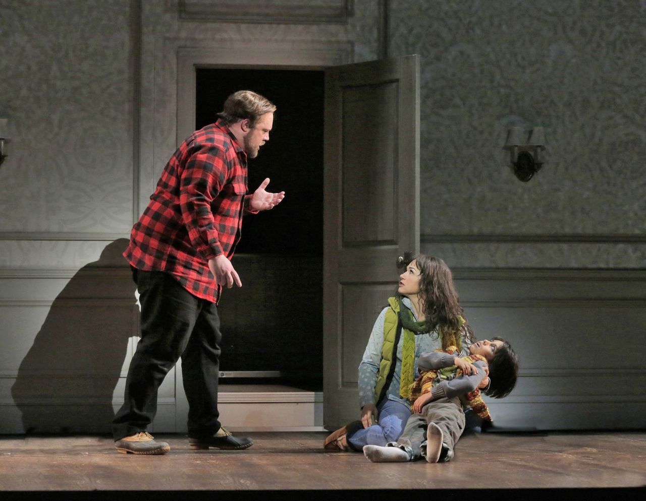 From left, Brian Mulligan as Jack Torrance, Kelly Kaduce as Wendy Torrance and Alejandro Vega as Danny Torrance perform in the Minnesota Opera New Works Initiative production of Stephen King’s “The Shining.”