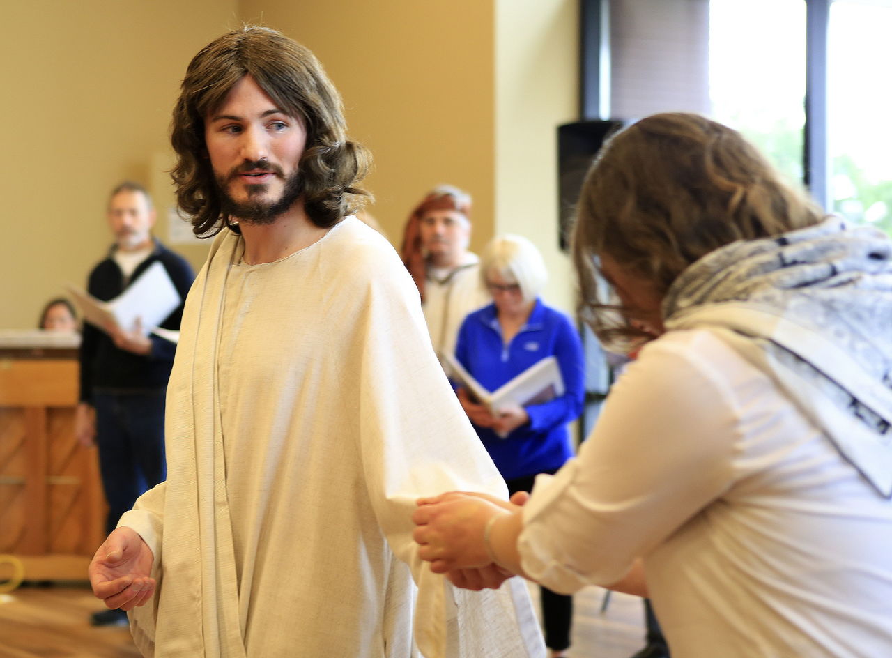 Galen Dole as Jesus performs during a rehearsal of “In His Hands: A Fisherman’s Journey.”