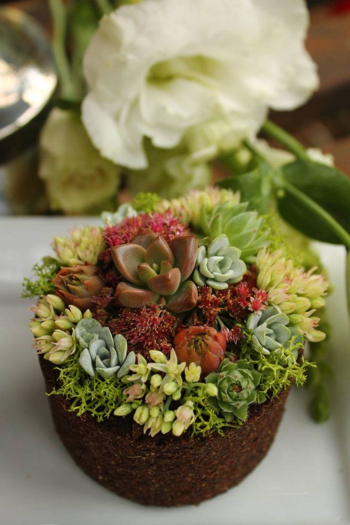 Mickey Blake’s floral cupcake will be in the display at Floral Soil Solutions at the Spring Green Art Festival on Friday and Saturday at the Lynnwood Convention Center.
