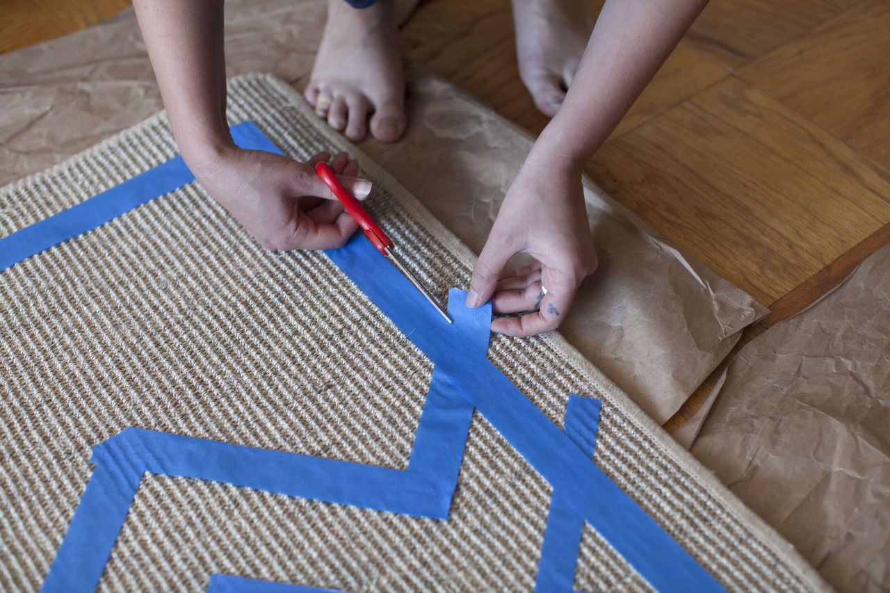 Step 4: Use scissors to trim any overlapping tape to ensure sharp lines.
