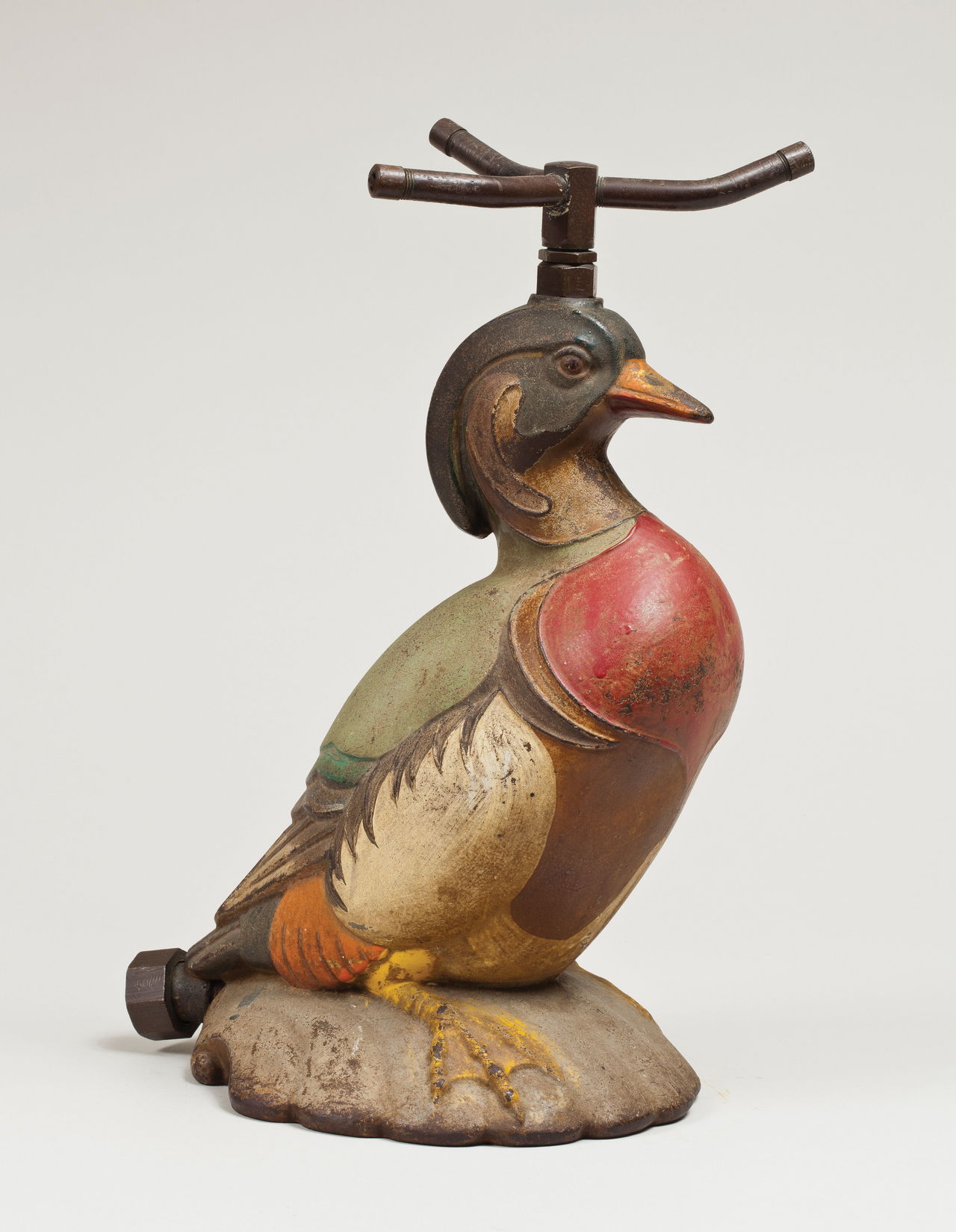 This wood duck-shaped iron sprinkler is in excellent condition. It probably was made in England in the 1920s or ‘30s.