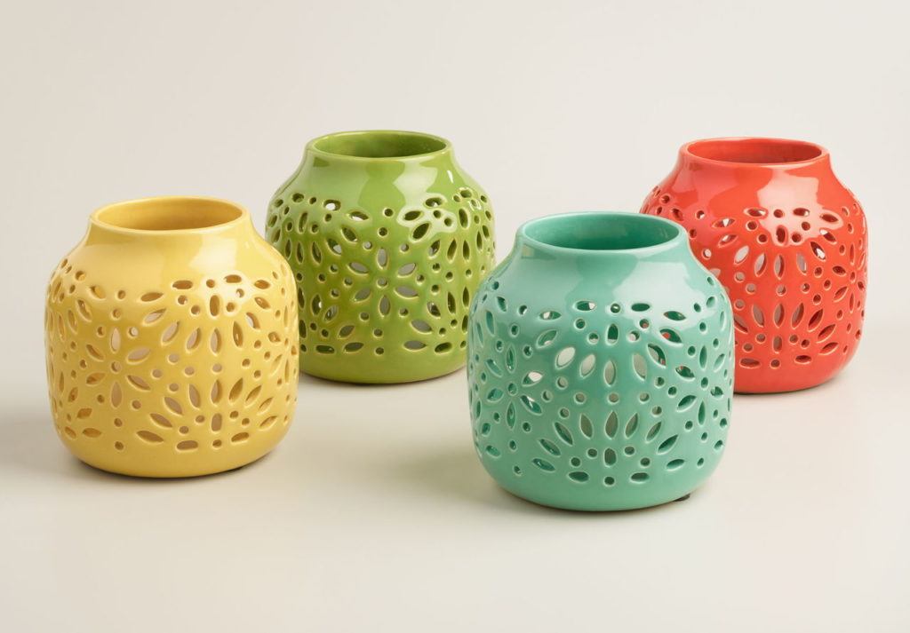 Scatter a few cutout glazed ceramic lanterns in your chosen palette and set your mood (worldmarket.com).
