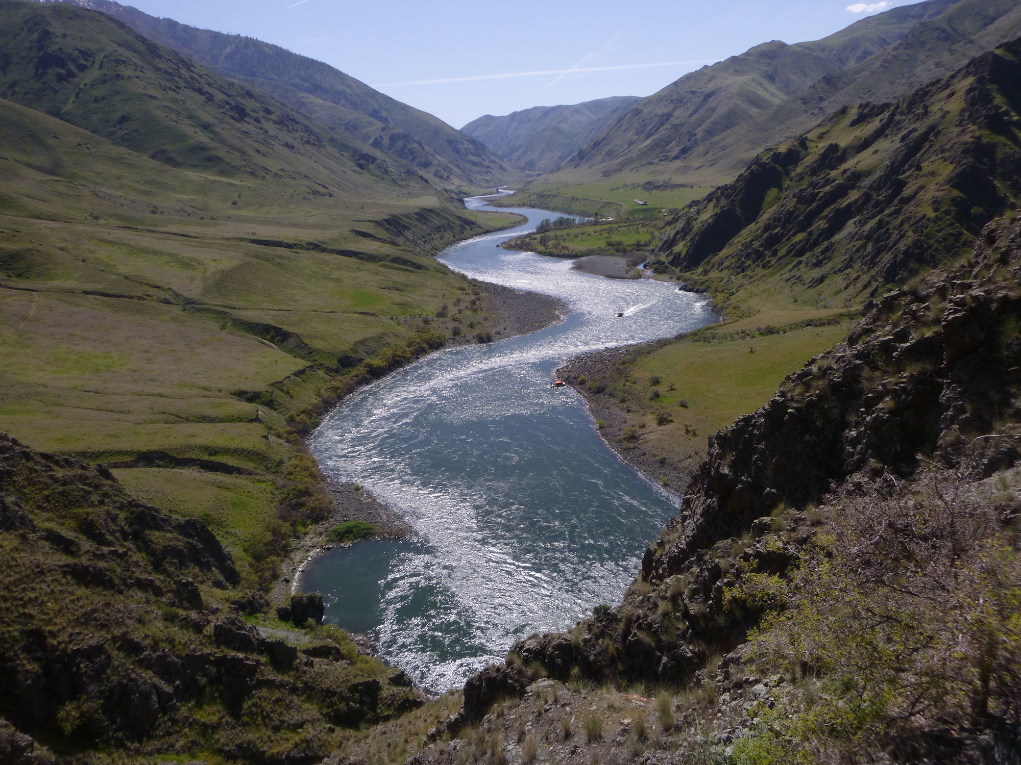 Jet boats run the river into Hells Canyon as seen from Snake River Trail 102 near Suicide Point.