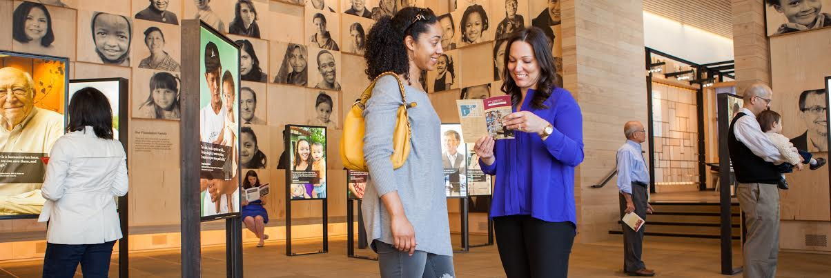 Exhibits at the Bill & Melinda Gates Foundation Visitor Center in Seattle convey information about poverty, food production, disease and education.