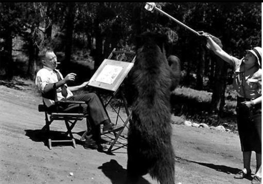 This 1933 photo, taken by former National Parks photographer George A. Grant in Yellowstone, was called “Bear artist with bear.”

