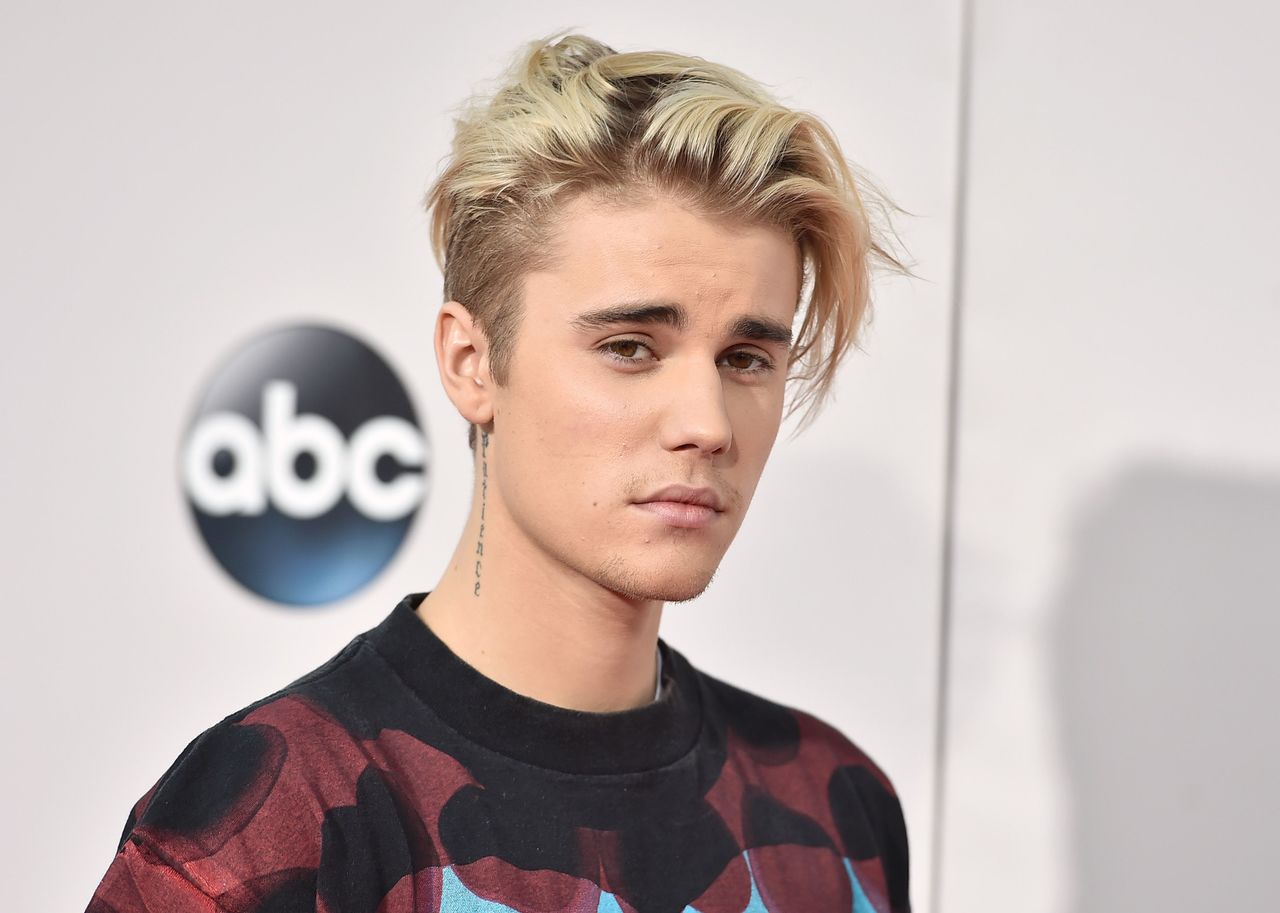 FILE - In this Sunday, Nov. 22, 2015 file photo, Justin Bieber arrives at the American Music Awards at the Microsoft Theater in Los Angeles. A singer songwriter has sued Bieber and Skrillex for copyright infringement over their multi-platinum song, “Sorry.” Casey Dienel, who performs under the name White Hinterland, filed suit against the two performers as well as their publishing companies, Universal Music and co-writers in federal court in Nashville, Tennessee, on Wednesday, May 25, 2016, which claims that “Sorry” uses a vocal riff from her song “Ring the Bell.” (Photo by Jordan Strauss/Invision/AP, File)