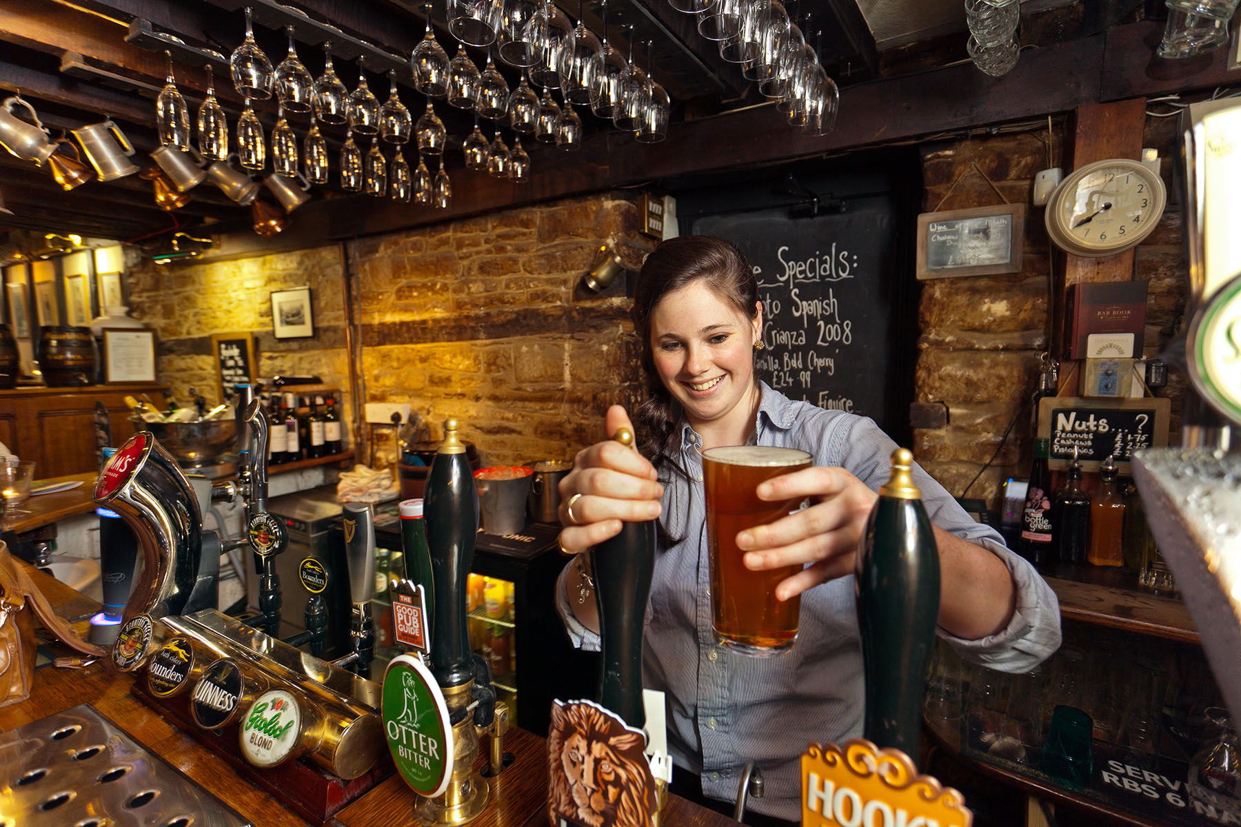 Head to a historic British pub to make friends with a bartender and get a glimpse — and a taste — of traditional English culture.