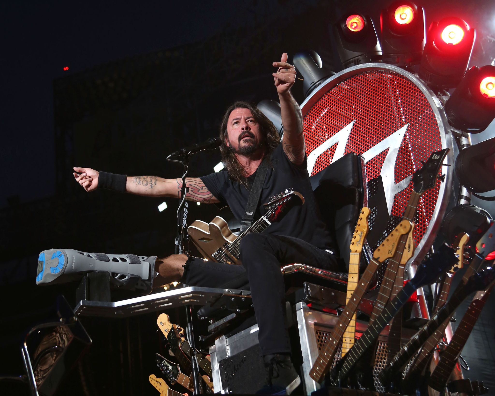 Dave Grohl of the Foo Fighters performs at Citi Field in New York on July 15. The band is suing insurers for failing to reimburse them for European shows they canceled following the Paris terrorist attacks in November.