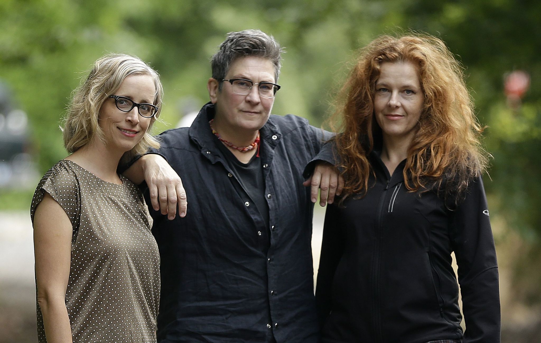 Singer-songwriters Laura Veirs (from left), k.d. lang and Neko Case pose for a photo in Portland, Oregon, on Thursday.