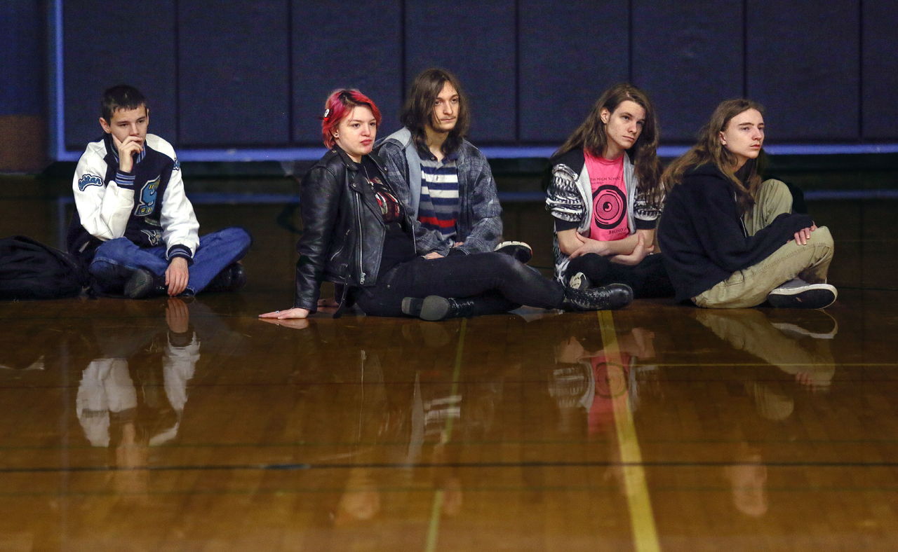 Some students move a little closer, sitting on the gym floor, as Erin Gruwell talks about her book and the movie “Freedom Writers” in the Sultan High School gymnasium in February.