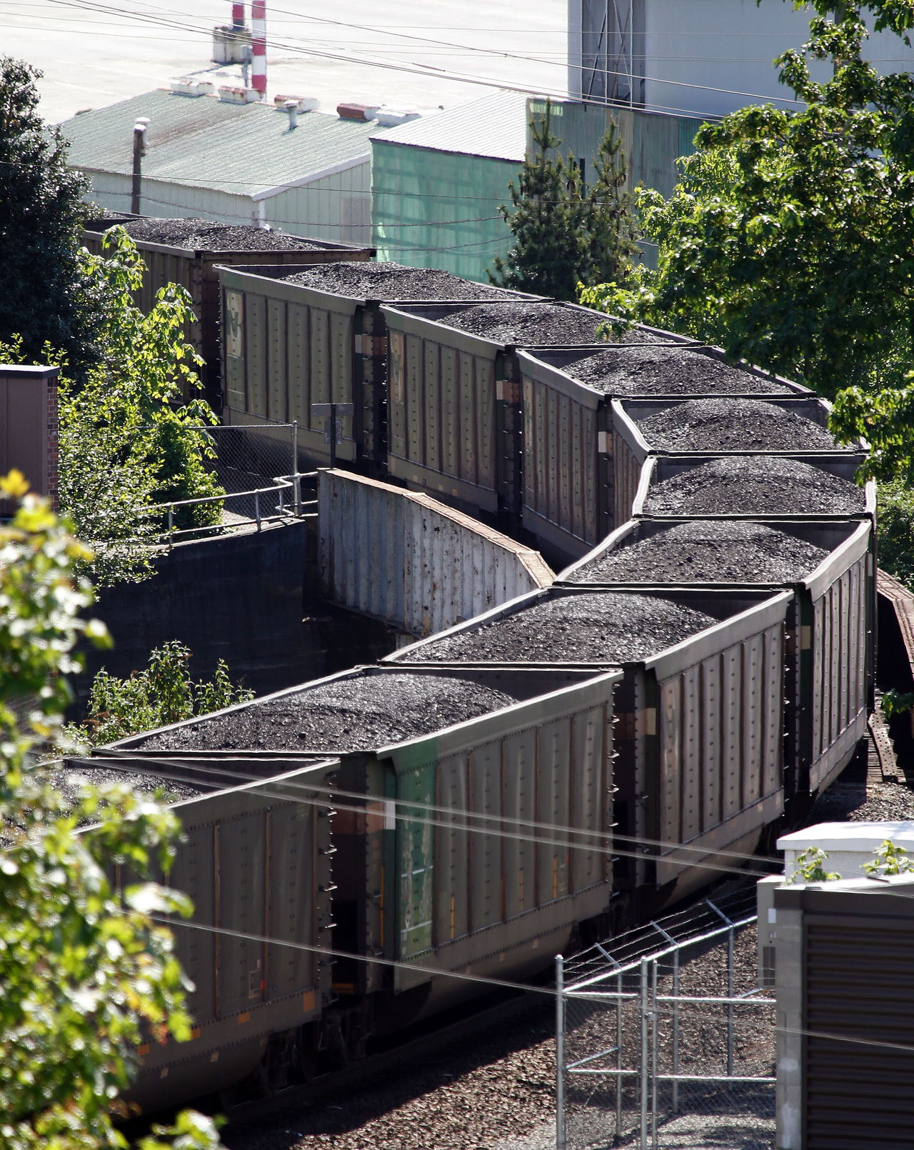 A coal train passes through Everett.