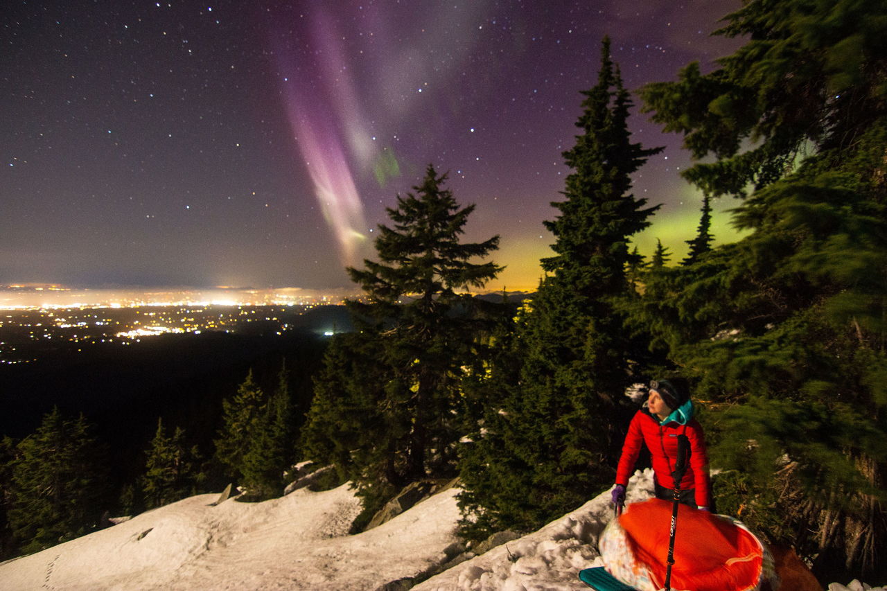 City lights and the aurora borealis put on a stunning light show as a rescue drama played out on the upper slopes of Mount Pilchuck.