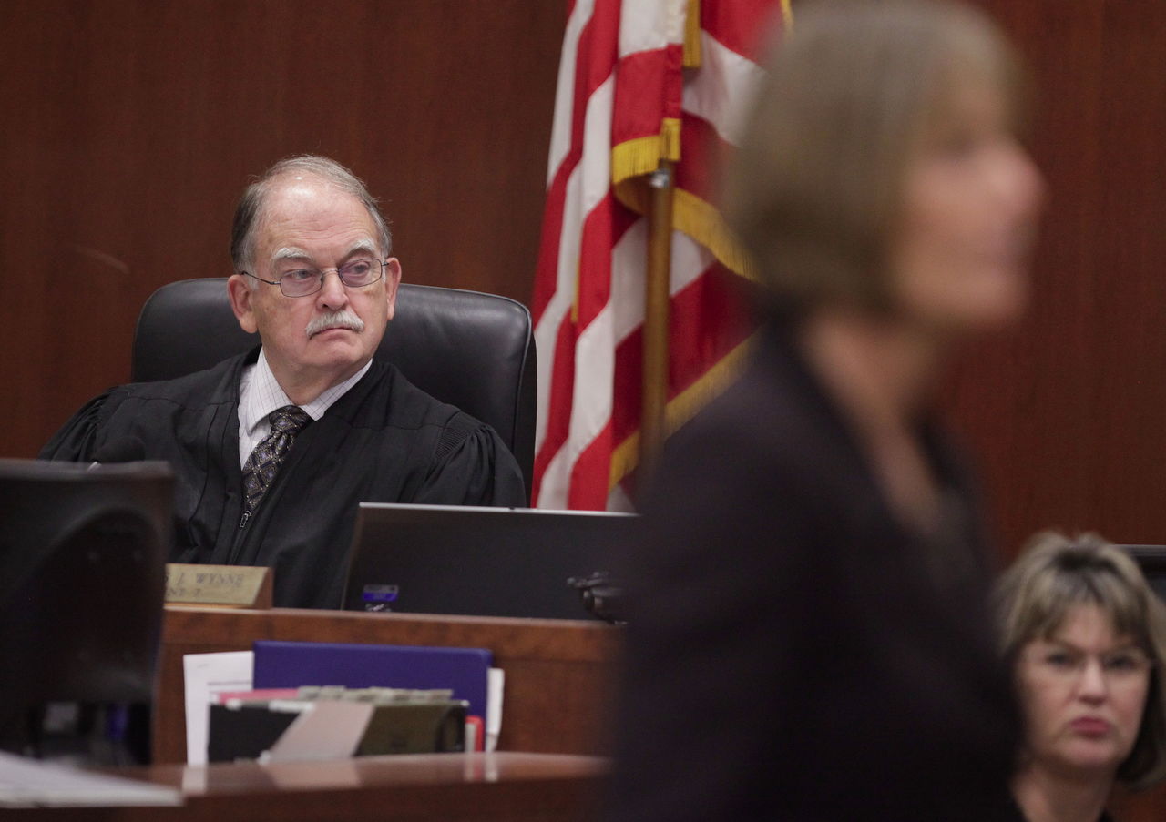 Superior Court Judge Thomas Wynne listens to Snohomish County deputy prosecutor Lisa Paul’s opening statement in Snohomish County Superior Court in 2012. Wynne will not seek re-election this year.