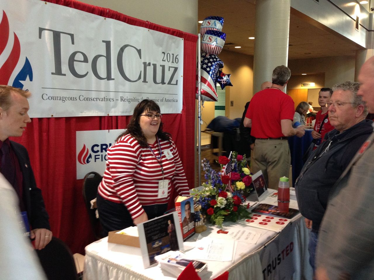 Jennifer Fetters, of Bellevue, works the Ted Cruz booth at the Washington state GOP convention in Pasco on Thursday. More than 2,000 Republicans from across Washington are expected to attend the convention, which runs through Saturday.
